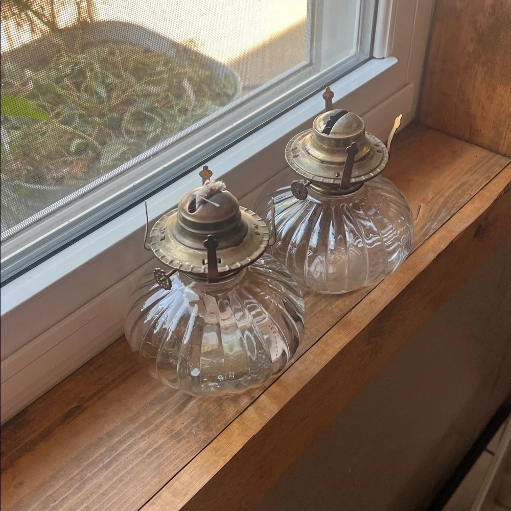Two matching vintage glass oil lamps